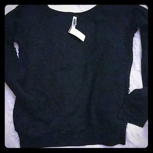 Black crew neck sweater.